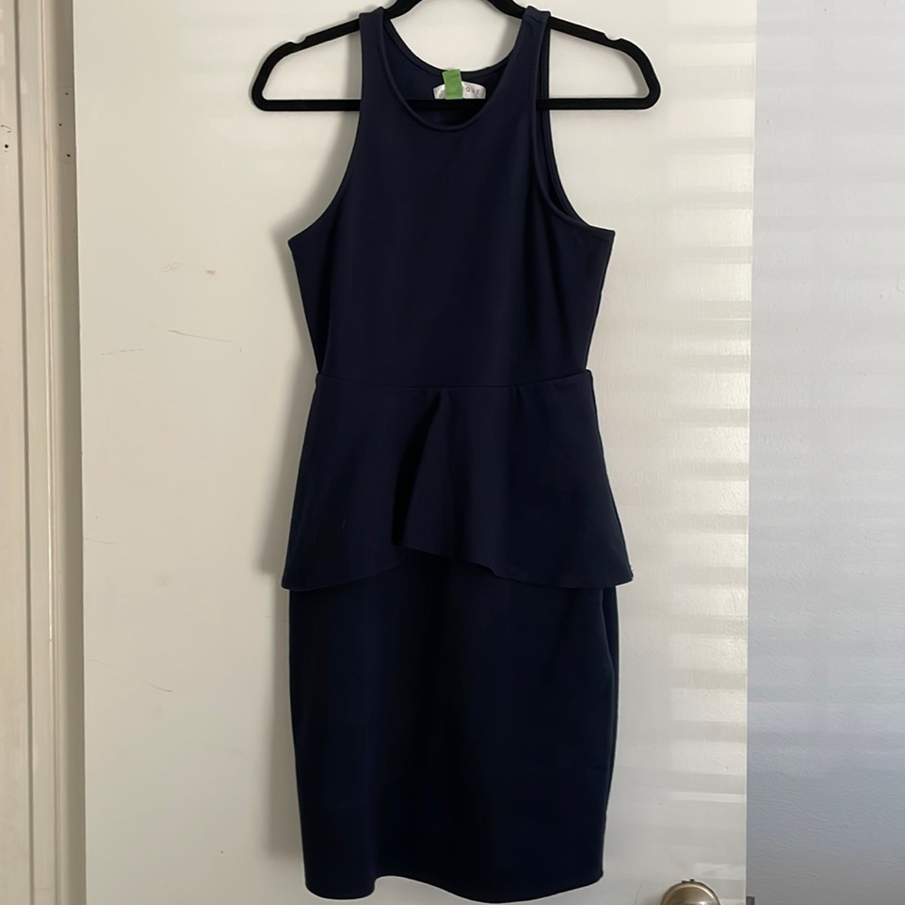 Medium navy peplum style dress